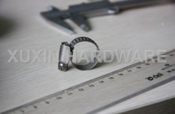 Embossed worm drive hose clamp